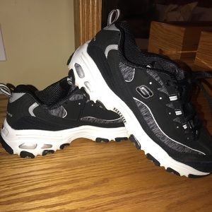 Sketchers D’lites sneakers.